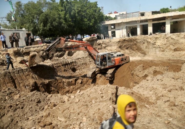 An excavator operates at the site where ancient ruins, which archaeologists say may be part of a Byz