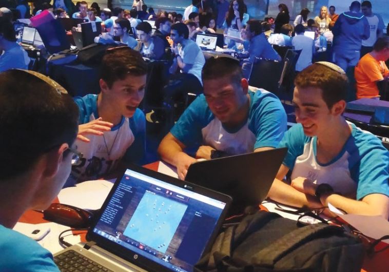 HIGH SCHOOL pupils compete in the finals of the National Cyber Conference in Tel Aviv yesterday.