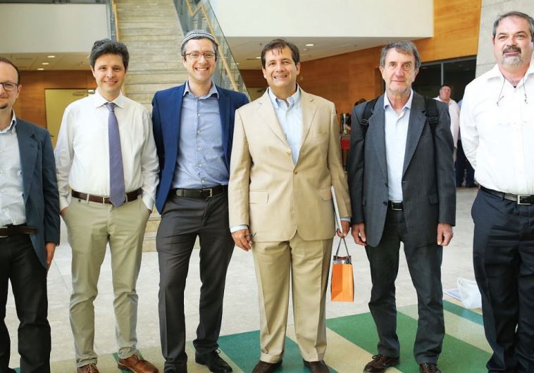 THE ITALIAN delegation poses for a photo with Italian Ambassador to Israel Francesco M. Talo (third 