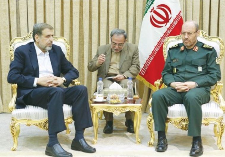 ISLAMIC JIHAD leader Ramadan Shalah (left) meets with Iranian Defense Minister Hossein Dehqan