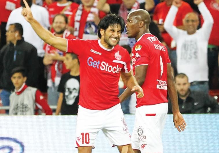 Hapoel Beersheba striker Elyaniv Barda (left) celebrates with teammate Anthony Nwakaeme 