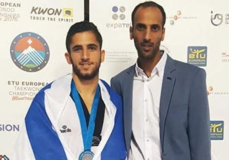 Israeli medalist Ron Atias (left)