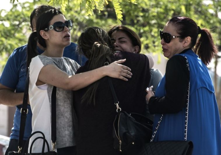 Families of passengers who were flying in an EgyptAir plane that vanished from radar react in Cairo