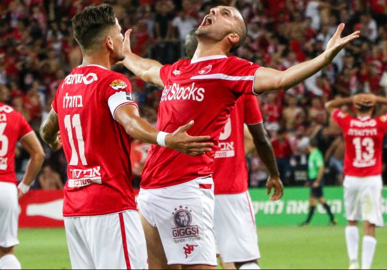 Hapoel Beersheba striker Ben Sahar (right) and teammate Maor Buzaglo, who both scored last night, ce