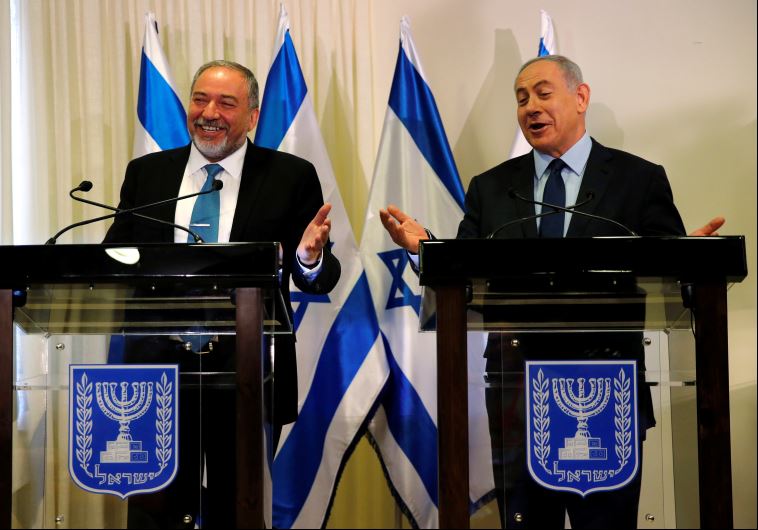 Avigdor Lieberman, head of far-right Yisrael Beitenu party, (L) and PM Benjamin Netanyahu