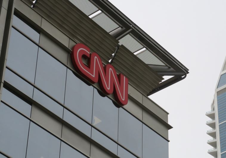 The CNN building (L) in Dubai Media City Park March 17, 2016.