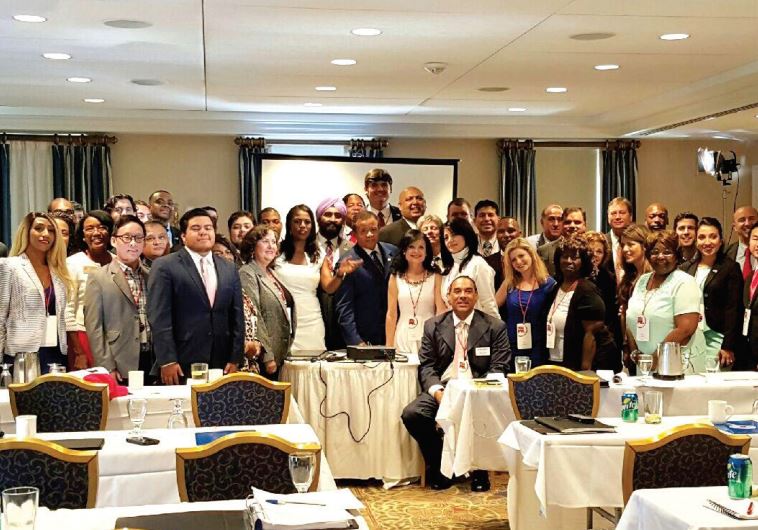 MEMBERS OF the National Diversity Coalition for Trump pose following a meeting in Washington last we