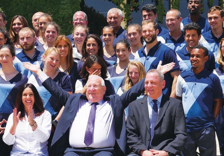 THE ISRAELI delegation to upcoming the Rio Olympics poses with President Reuven Rivlin at his reside