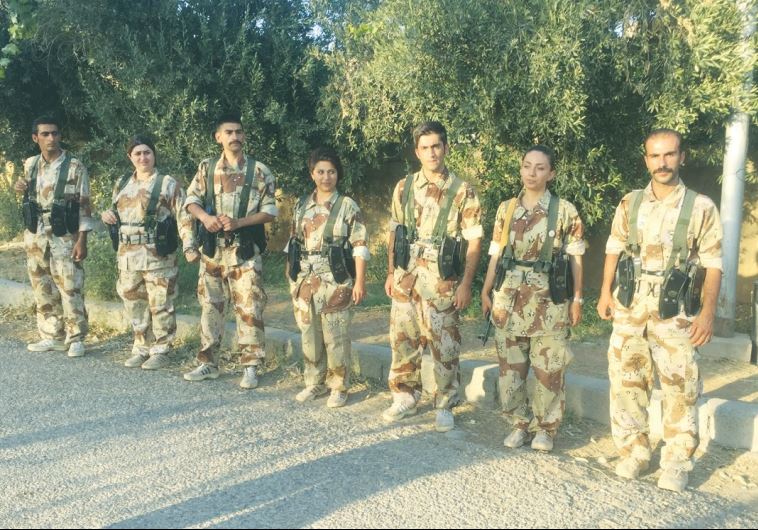KURDISH PDKI Peshmerga train to go to Iran to resist the regime.