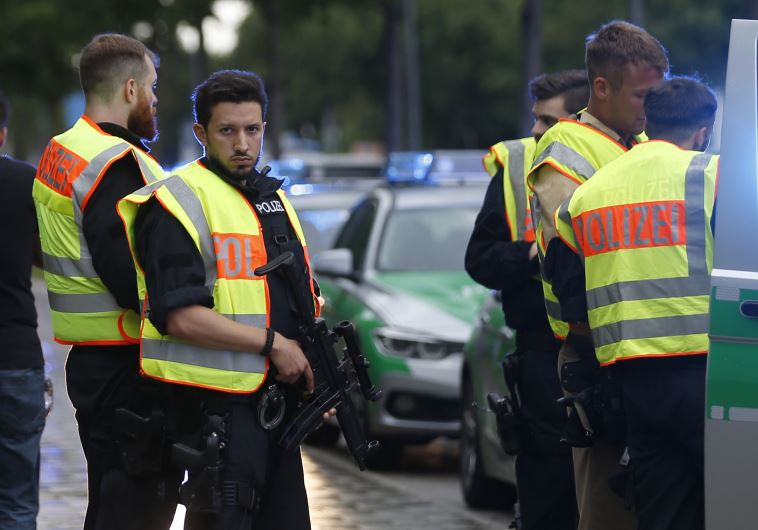 Police secure a street near to the scene of a shooting in Munich, Germany July 22, 2016