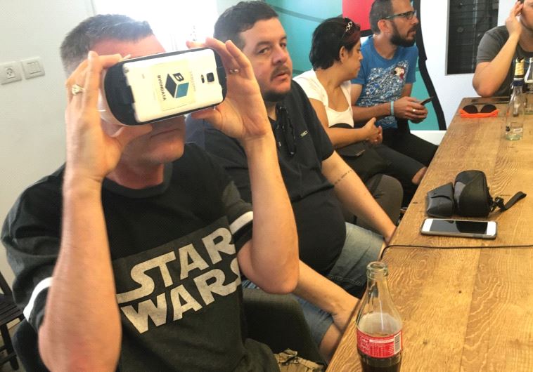 CONFERENCE GUESTS try out a ByonData virtual experience in Tel Aviv yesterday.