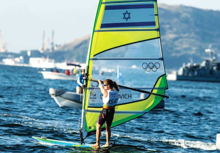 Windsurfer Maayan Davidovich came agonizingly close to winning Israel's 10th Olympic medal yesterday