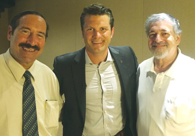 JOE FRAGER (left), Pete Hegseth (center) and Paul Brody pose at the King David Hotel in Jerusalem