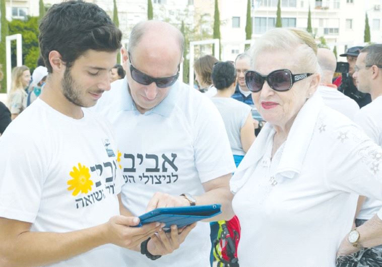 AVIV VOLUNTEERS aid a client.