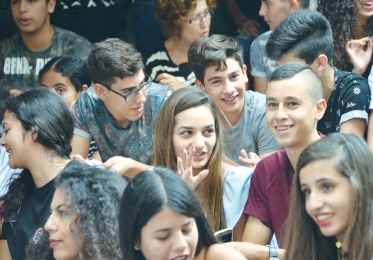 ARAB AND JEWISH STUDENTS gather on the first day of school Thursday at Jerusalem’s bilingual Max Ray