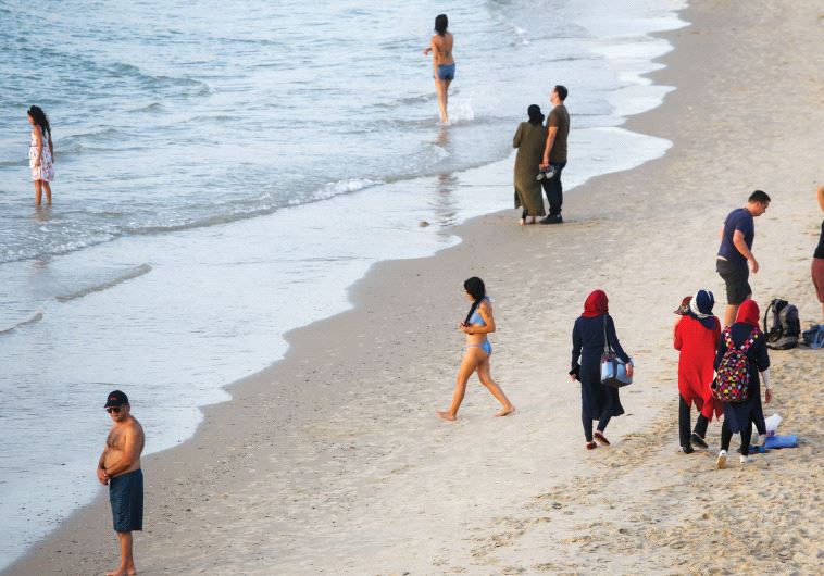 Beachgoers in Tel Aviv