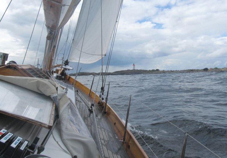 ‘THERE WAS an eerie quality to the dimly lit harbor which reminded me of a nighttime scene from a sp