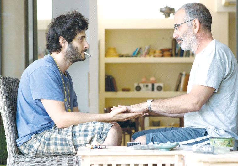 TOMER KAPON (left) and Shai Avivi in a scene from ‘One Week and a Day.’