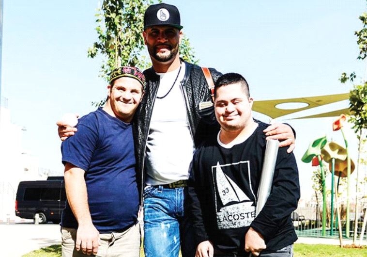 MAJOR LEAGUE BASEBALL superstar Albert Pujols (center), of the Los Angeles Angels, visited Shalva’s 