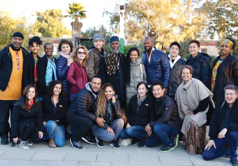 A GROUP of Hollywood TV actors including Mark Pellegrino (above, standing sixth from left) take part