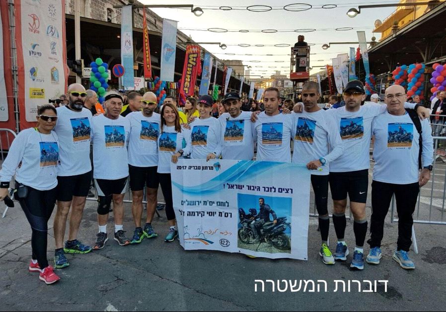  Thousands run in memory of fallen officer