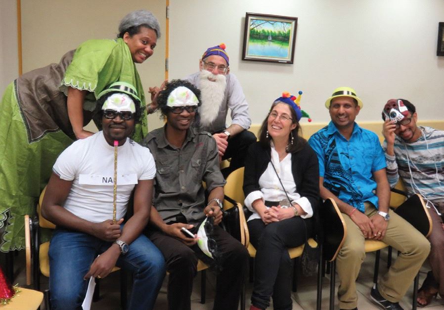 FOREIGN STUDENTS at the school’s Purim party with Professor Paltiel.