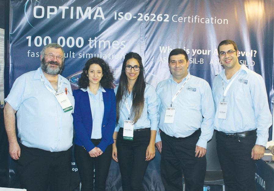 THE OPTIMA team poses at the 2016 ChipEx Conference in Tel Aviv.