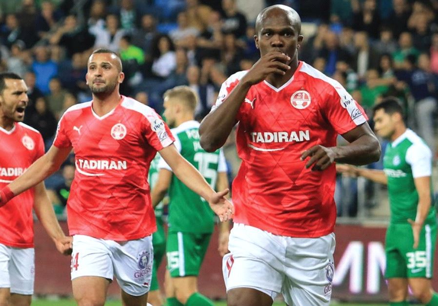 Hapoel Beersheba forward Anthony Nwakaeme (right) celebrates after scoring his team’s winner in last