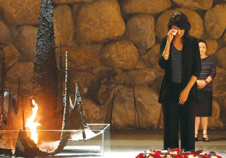 US AMBASSADOR to the UN Nikki Haley wipes a tear after laying a wreath at the Yad Vashem Hall of Rem