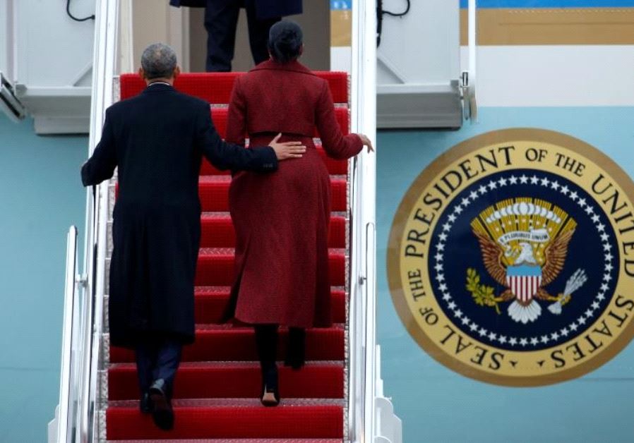 Obama and Michelle board Special Air Mission 28000, a Boeing 747 which serves as Air Force One