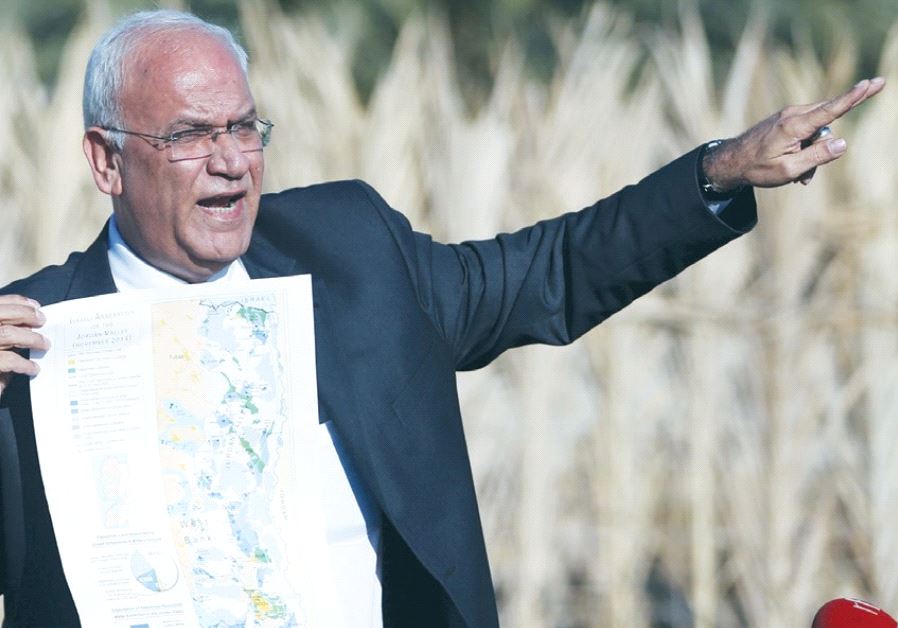 SENIOR PLO OFFICIAL Saeb Erekat speaks to reporters about Israeli appropriation of West Bank land, n