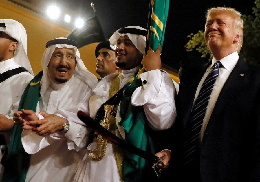 US President Donald Trump pictured dancing with swords at a reception ceremony held in his honor in 