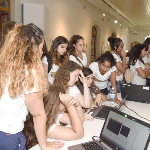 Teen girls study at a cyber-tech summer camp in Beersheba 