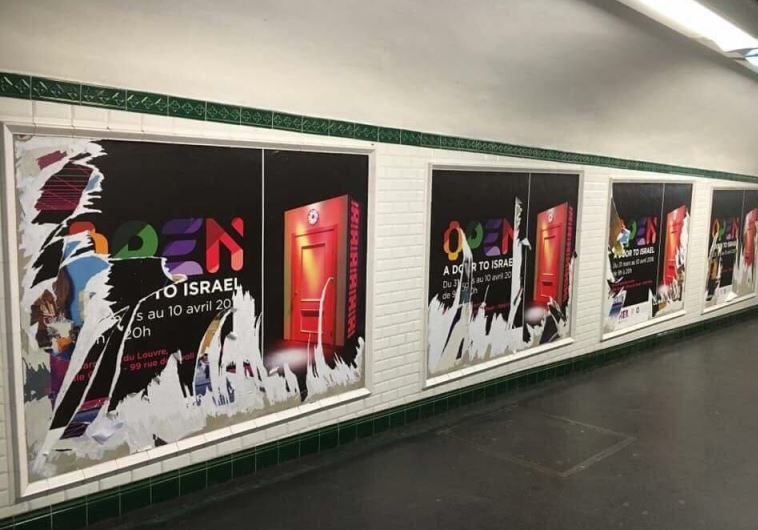 Vandalized ad for 'Open a Door to Israel' in Paris