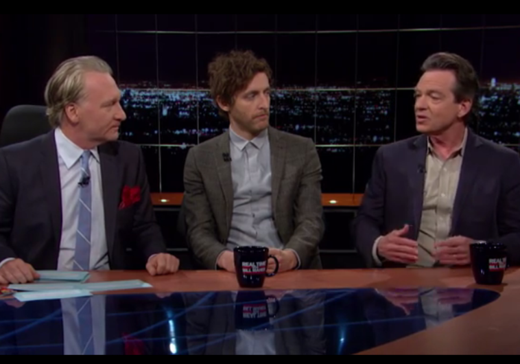 Author Lawernce Wright speaking with Bill Maher