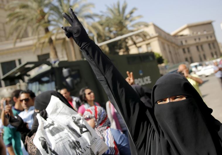 A Muslim Brotherhood member shouts slogans during an anti-government protest in Cairo