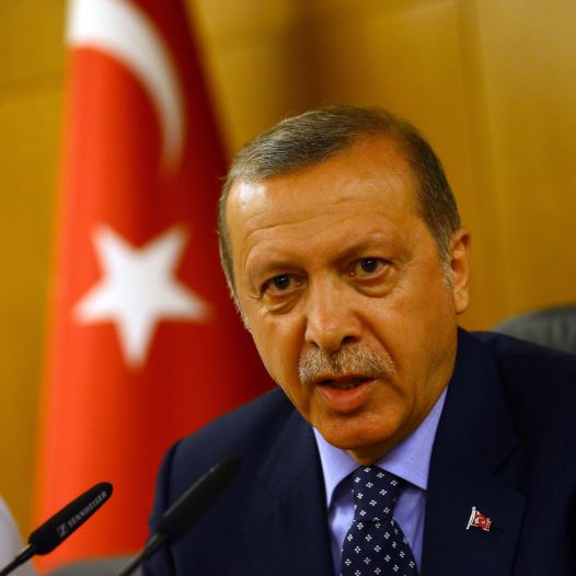 Turkish President Tayyip Erdogan speaks to media in the resort town of Marmaris, Turkey