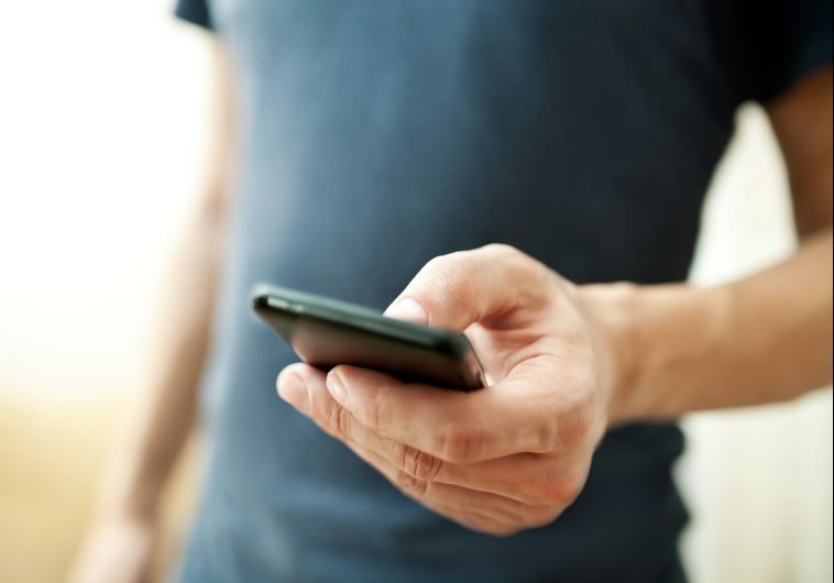 Man using smartphone