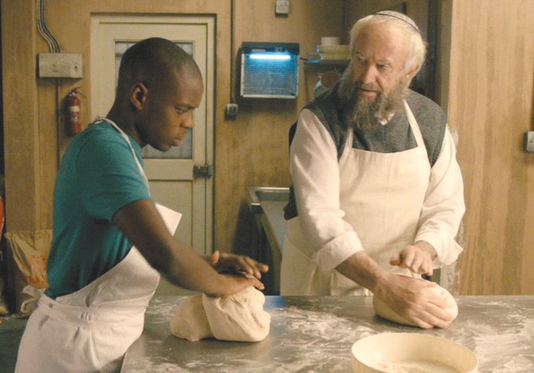 NAT AND Ayyash work in the bakery kitchen in ‘Dough.’