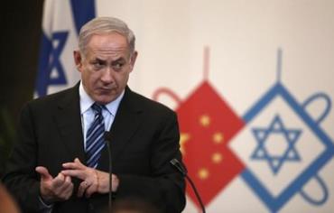 Prime Minister Binyamin Netanyahu gives a speech during a gala dinner in Shanghai , May 6