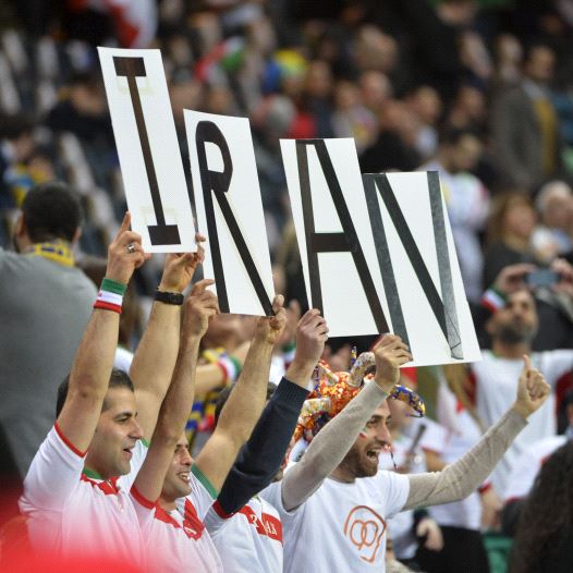 Iran's fans cheer for their team