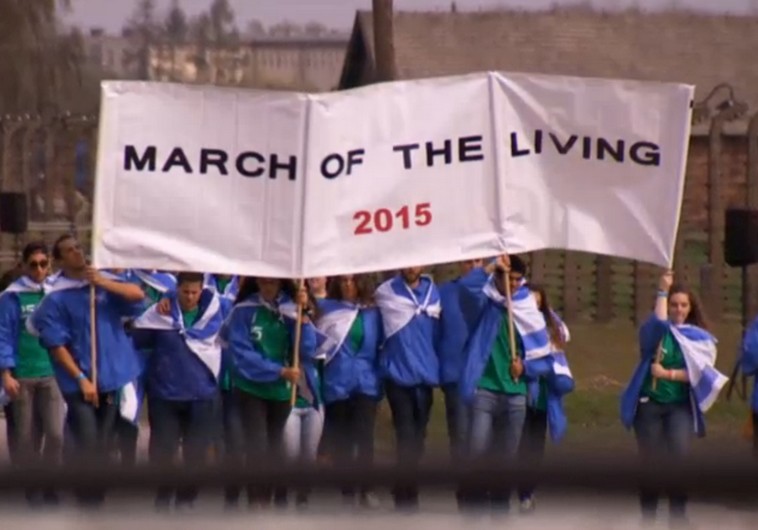 Thousands walk from Auschwitz to Birkenau in March of the Living