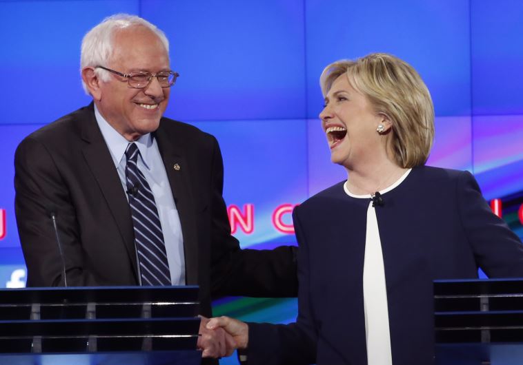 Clinton says her campaign talking to Sanders camp about unifying Democrats