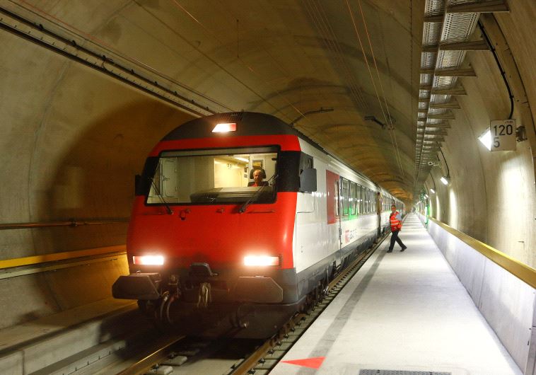 A train stands at the multifunction and emergency stop station of the NEAT Gotthard Base Tunnel, the