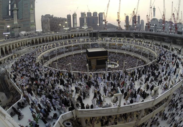 Muslim pilgrims pray around the holy Kaaba during their final circling at the Grand Mosque 