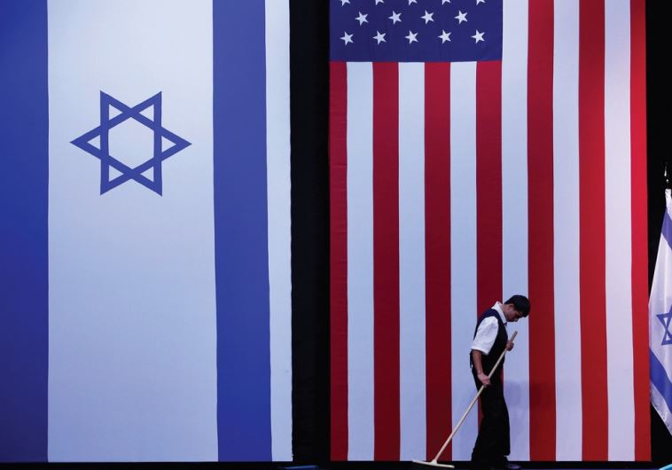 A MAN cleans up the floor after Barack Obama’s speech in Jerusalem in 2013