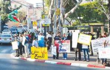 PEOPLE DEMONSTRATE against planned national-religious housing in Jaffa yesterday
