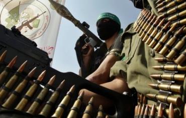 Hamas members take part in a rally