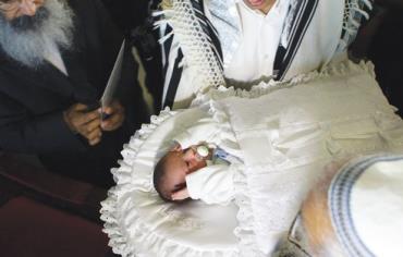 Baby undergoes circumcision
