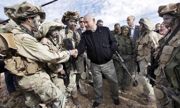 Netanyahu shakes hands with IDF soldiers [file]